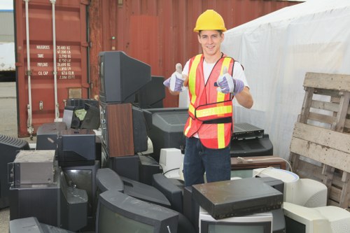 Professional team assessing a loft for clearance in Camdentown